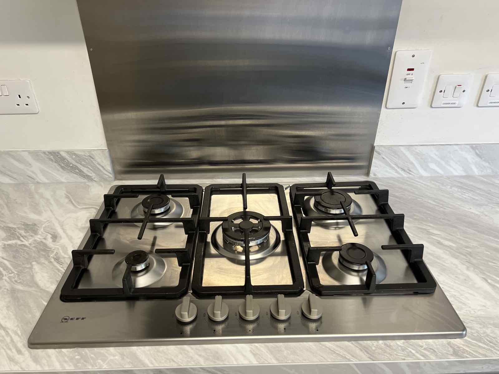 Spotless gas hob after cleaning